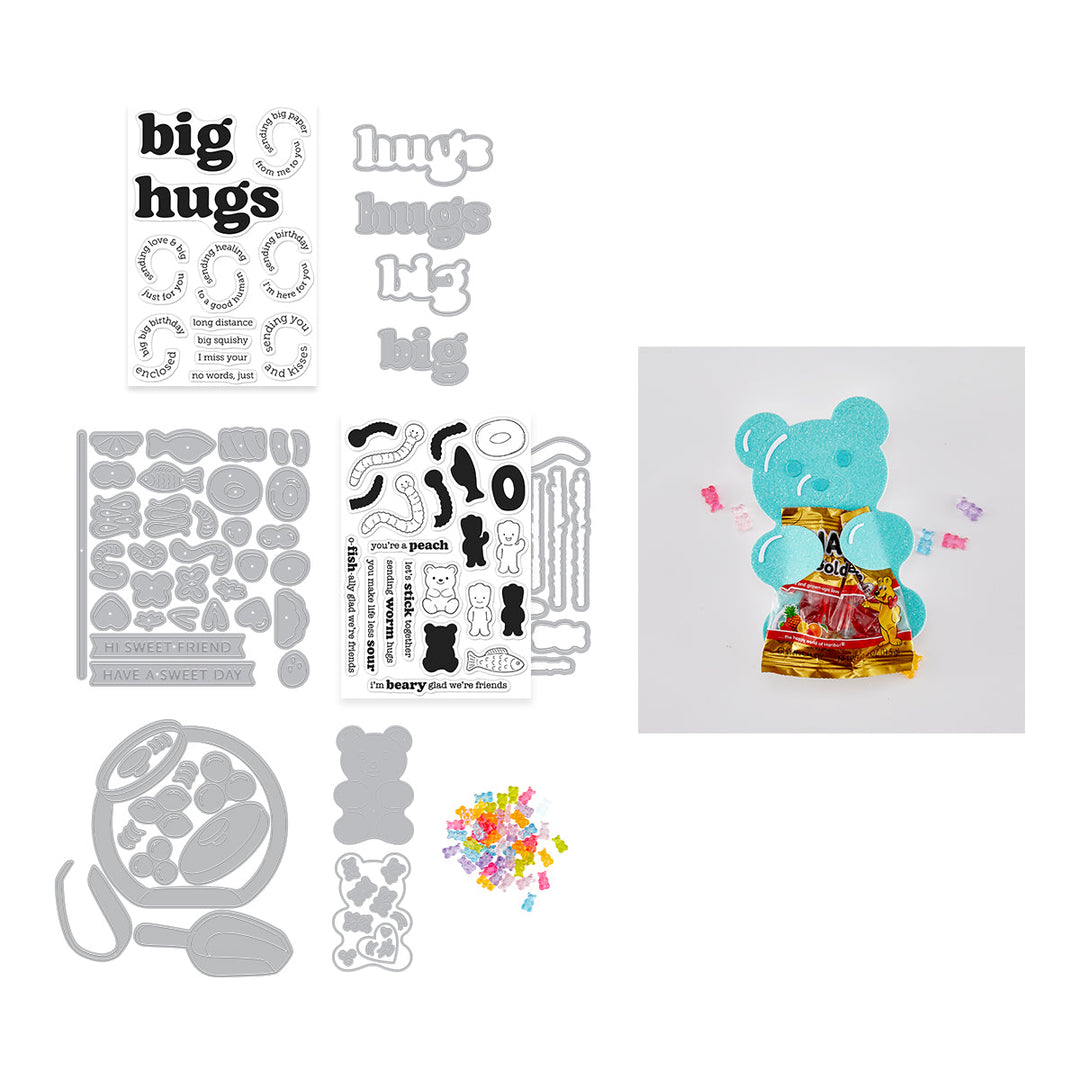Collection of clear stamps and metal dies, and a bear shaped card.