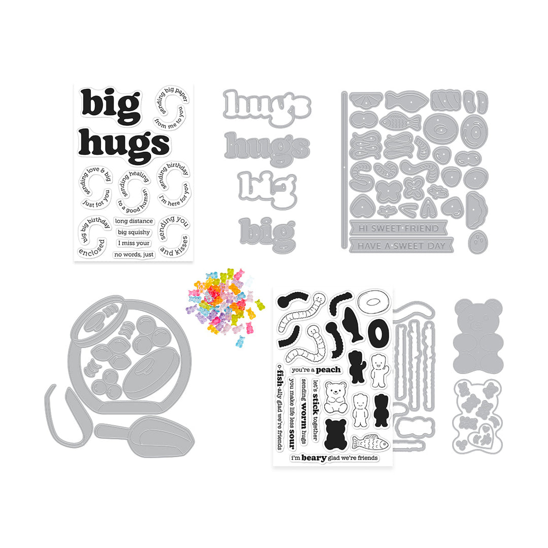 Collection of clear stamps with phrases and metal dies, and gummy bear embellishments.