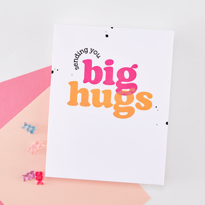Card with 'sending you big hugs' text on a white background