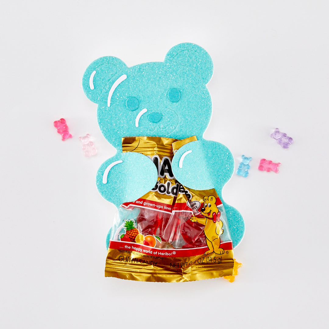 Blue bear-shaped candy bag with visible text on a white background